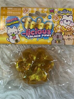 NWT Limited Edition Taba-Licious Golden Paws golden glitter/marble paw squishy